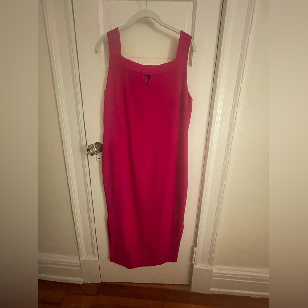 Pink dress. It’s an a-line/ shift fit.